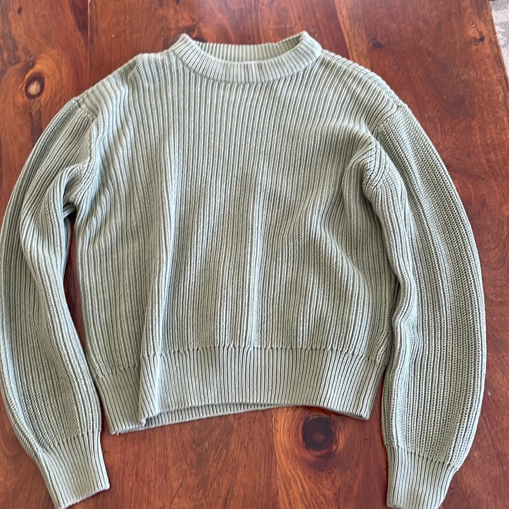 Green knitted sweater